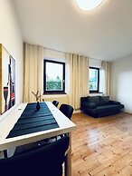 Cozy 3BR Apt with Garden Sleeps 10