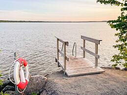 Serene Lakehouse With Rowing Boat