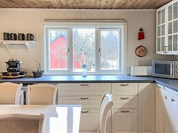 Serene Lakehouse With Rowing Boat