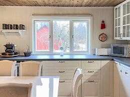 Serene Lakehouse With Rowing Boat