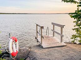 Serene Lakehouse With Rowing Boat