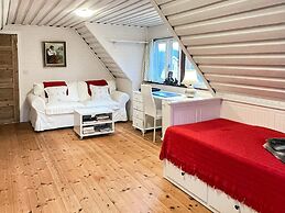 Serene Lakehouse With Rowing Boat