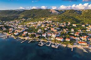 Apartment Rab With Private Dock and Sea Views
