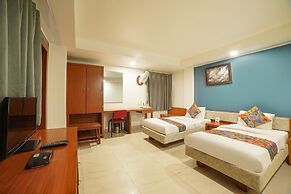 Fabhotel Pleasure Inn