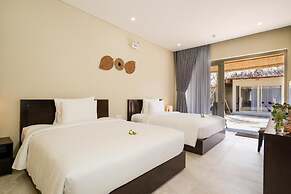 Coco Cottage Beachfront Resort