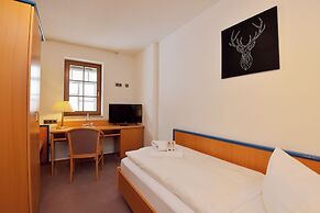 Landhotel Der Distelhof mit Scheunencafé