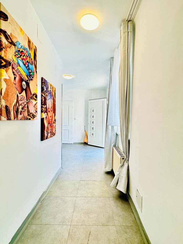 Affordable 4BR Apt Walk to FAC Platz