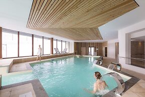 Apartment in Le Corbier With Spa & Pool
