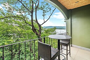 Luxury Condo with Panoramic Ocean Views, Sparkling Infinity Pool, and 