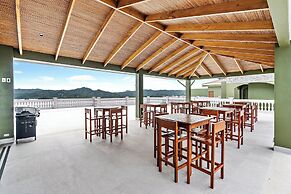 Luxury Condo with Panoramic Ocean Views, Sparkling Infinity Pool, and 