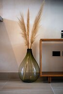 Guest INN Home - Elements Suites
