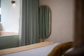 Guest INN Home - Elements Suites
