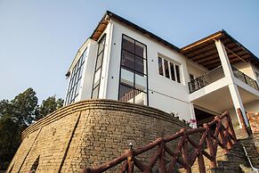 Spellmount - Himalayan View Infinity Pool Resort In Kausani