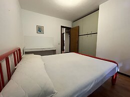 026 Bilocale con Caminetto Giustino