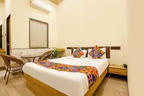 FabHotel Malali Residency