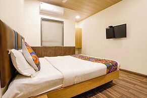 FabHotel Malali Residency