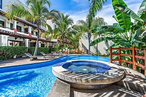 Modern Split-Level 2-Bedroom Condo with Pools, Terrace & Easy Beach Ac