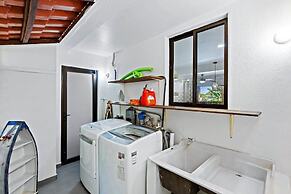 Modern Split-Level 2-Bedroom Condo with Pools, Terrace & Easy Beach Ac