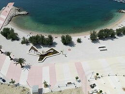 Seaside Apartment with Pool