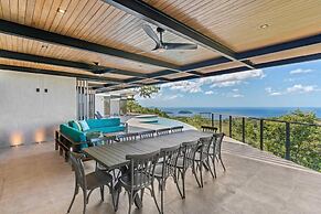Luxurious Ultramodern Property with Private Suites, Infinity Pool, and