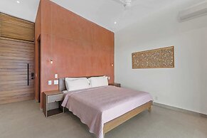 Luxurious Ultramodern Property with Private Suites, Infinity Pool, and