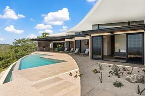 Luxurious Ultramodern Property with Private Suites, Infinity Pool, and