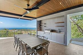 Luxurious Ultramodern Property with Private Suites, Infinity Pool, and