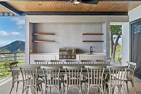 Luxurious Ultramodern Property with Private Suites, Infinity Pool, and