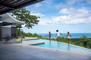 Luxurious Ultramodern Property with Private Suites, Infinity Pool, and
