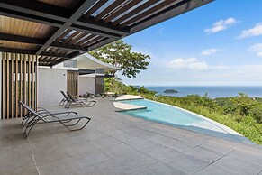 Luxurious Ultramodern Property with Private Suites, Infinity Pool, and