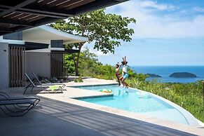 Luxurious Ultramodern Property with Private Suites, Infinity Pool, and