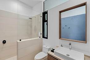 Luxurious Ultramodern Property with Private Suites, Infinity Pool, and