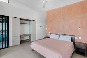 Luxurious Ultramodern Property with Private Suites, Infinity Pool, and