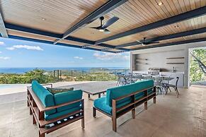 Luxurious Ultramodern Property with Private Suites, Infinity Pool, and