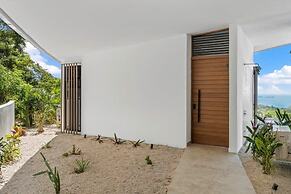 Luxurious Ultramodern Property with Private Suites, Infinity Pool, and