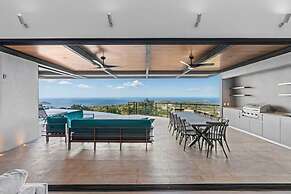 Luxurious Ultramodern Property with Private Suites, Infinity Pool, and