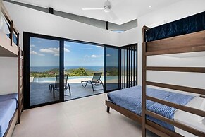 Luxurious Ultramodern Property with Private Suites, Infinity Pool, and