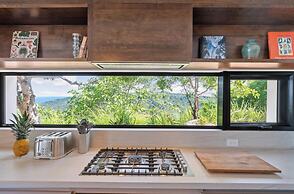 Luxurious Ultramodern Property with Private Suites, Infinity Pool, and
