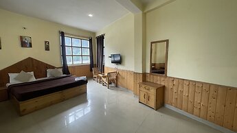 Singh Saab Rooms & Cafe