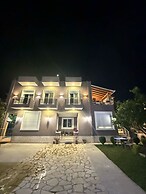 Maison Apartments
