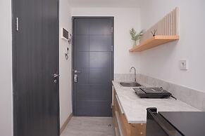 Warm Cozy Studio Room at Collins Boulevard Apartment