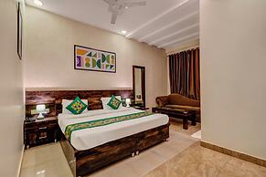 Treebo Riddhi Paradise - 15 mins from Airport