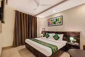 Treebo Riddhi Paradise - 15 mins from Airport