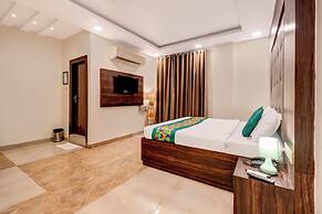Treebo Riddhi Paradise - 15 mins from Airport