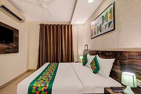 Treebo Riddhi Paradise - 15 mins from Airport