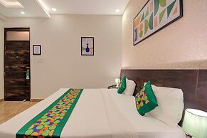 Treebo Riddhi Paradise - 15 mins from Airport