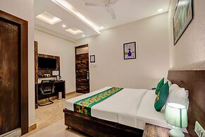 Treebo Riddhi Paradise - 15 mins from Airport