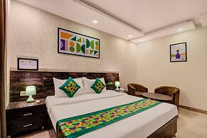 Treebo Riddhi Paradise - 15 mins from Airport