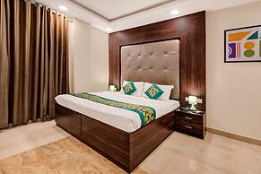 Treebo Riddhi Paradise - 15 mins from Airport