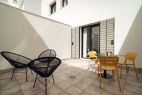 Los Olivos Apartments by Olala Homes